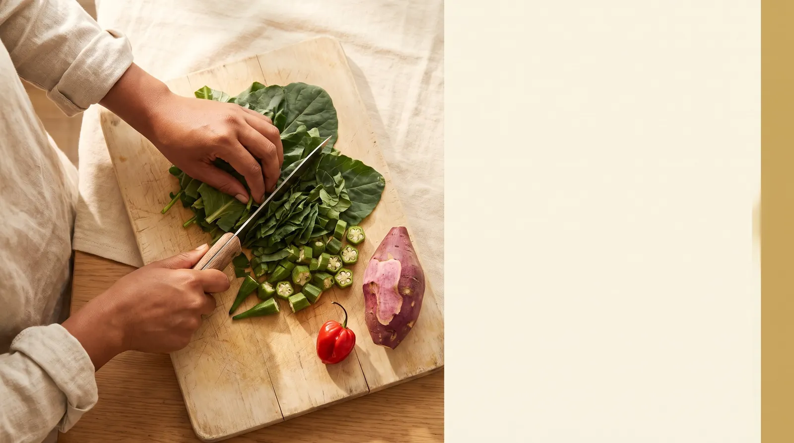 Hands chopping fresh greens and peppers on a wooden board